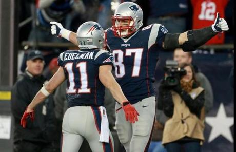 Rob Gronkowski celebrated with teammate Julian Edelman after he caught a touchdown in the first quarter. 

